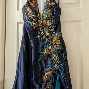 Peacock embroidered blue and teal evening gown